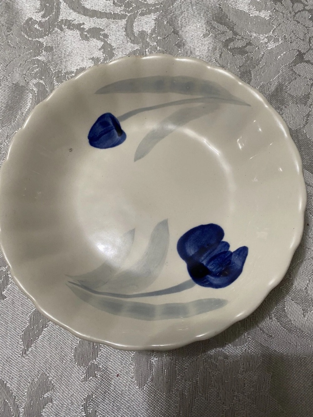 Hand-Painted White Ceramic Bowl with Blue Floral Motif